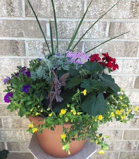 10 inch outdoor planter with bird or fairy